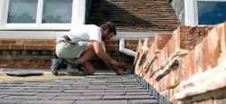 Roofing contractor working