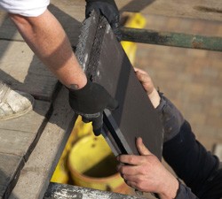 Contractors working on a roof